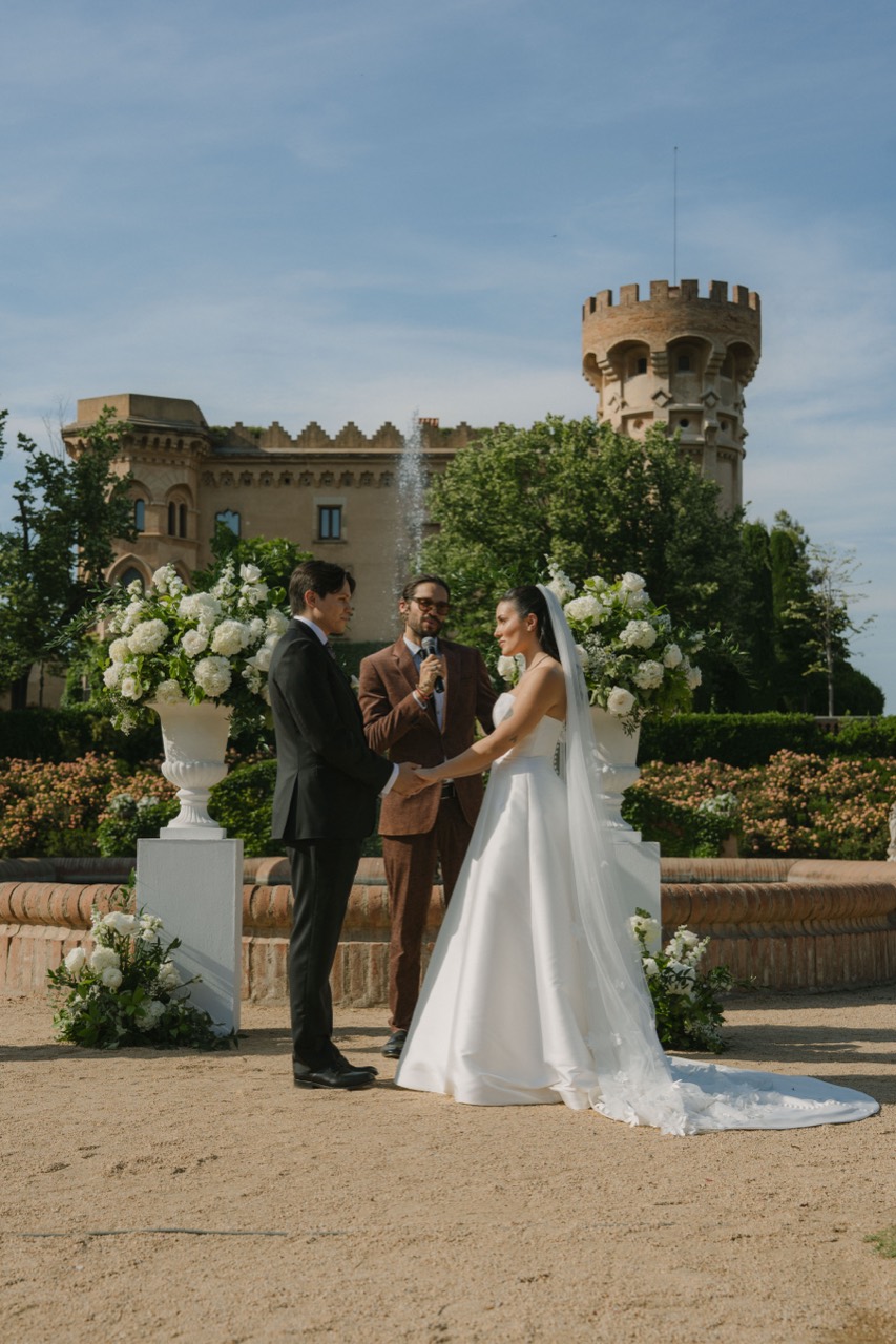Karim officiating Eda and Santi's wedding ceremony