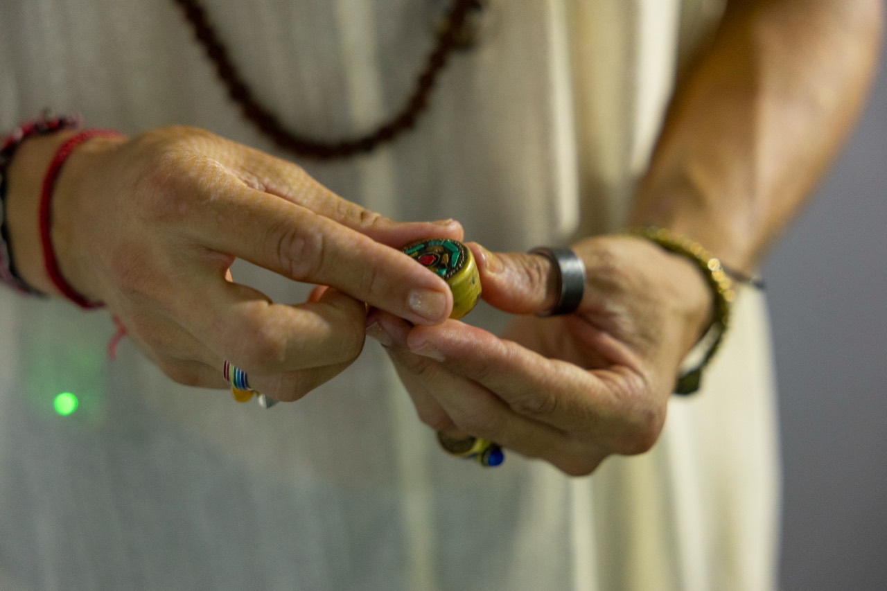 Karim holding a ceremonial object