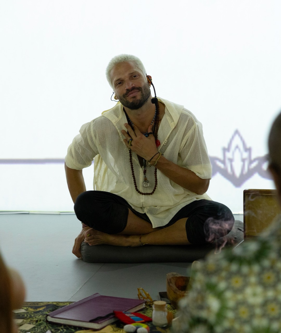 Karim Maida guiding a ceremony